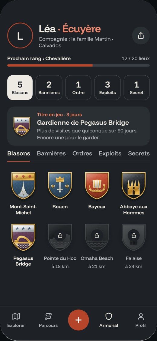 Écran de l’app : l’armorial et ses blasons gagnés.